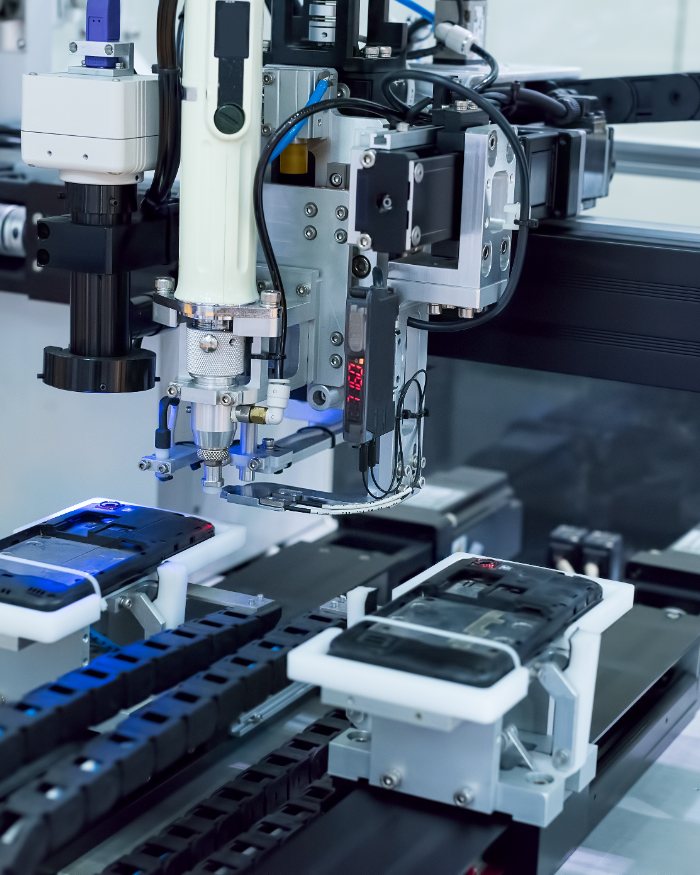 Multi-axis test station with DUT carriers and probe interface